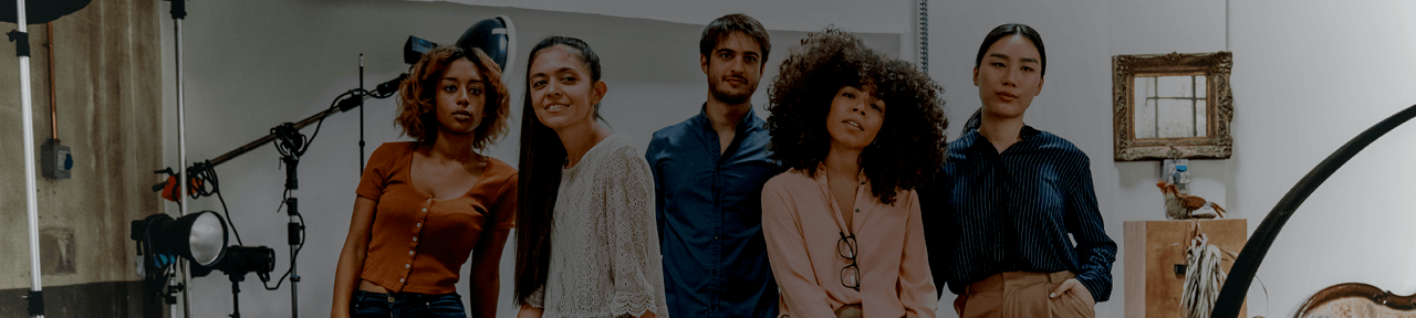 Group of People Standing Together on Set